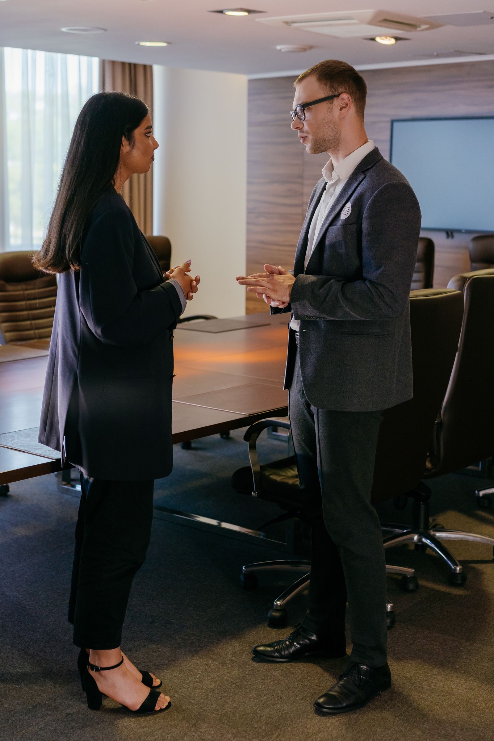 Professionals in a focused conversation